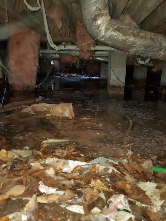 Crawl space flood assessment for Commercial Water Damage Restoration in Eau Claire